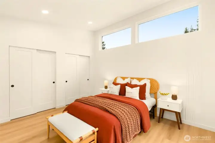 Nearby, your primary suite and its high ceilings calls your name. Featuring two side-by-side closets and of course a private en-suite bath