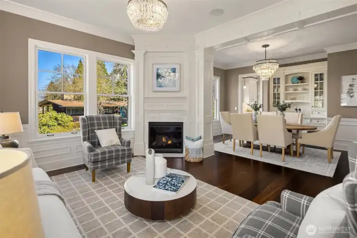 Adjacent dining room with exquisite millwork.