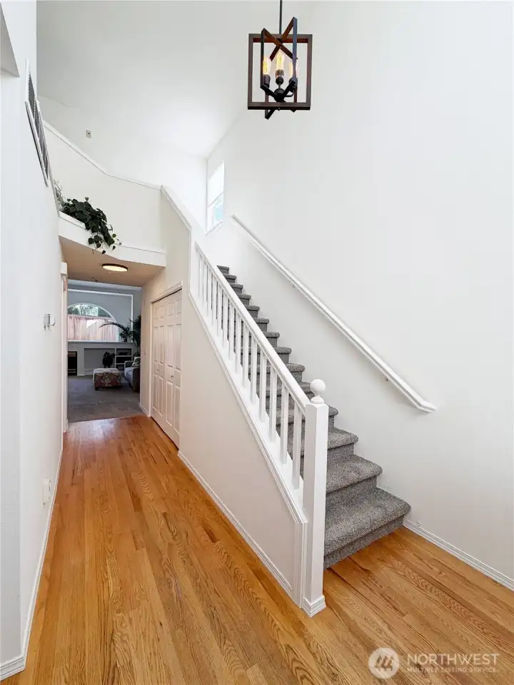 Grand entry with wood floors