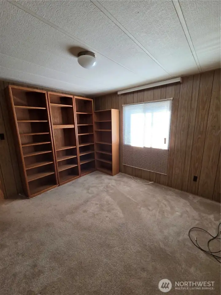 Nice set of bookshelves in back bedroom