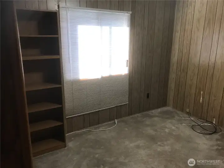 Back bedroom or office with nice book cases