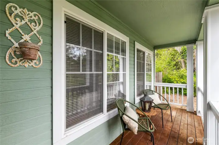 Enjoy your morning coffee year-round from the comfort of this covered front porch.