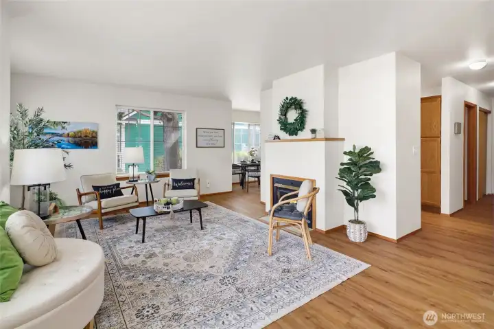 A welcoming gas fireplace adds comfort and charm to the heart of the home.