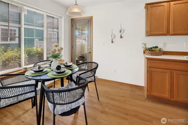 Bright and welcoming dining area opens directly to the covered patio for seamless everyday living.
