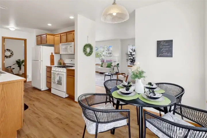The centrally located galley kitchen keeps the home feeling connected and comfortable.