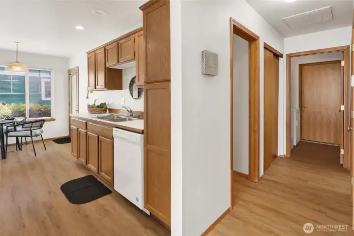 The hallway to the bedrooms, laundry & garage.
