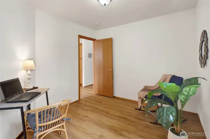 Located adjacent to the kitchen and next to the full bath.