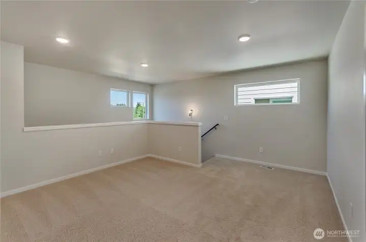 Photos are taken of a Shelby plan previously built in the community.