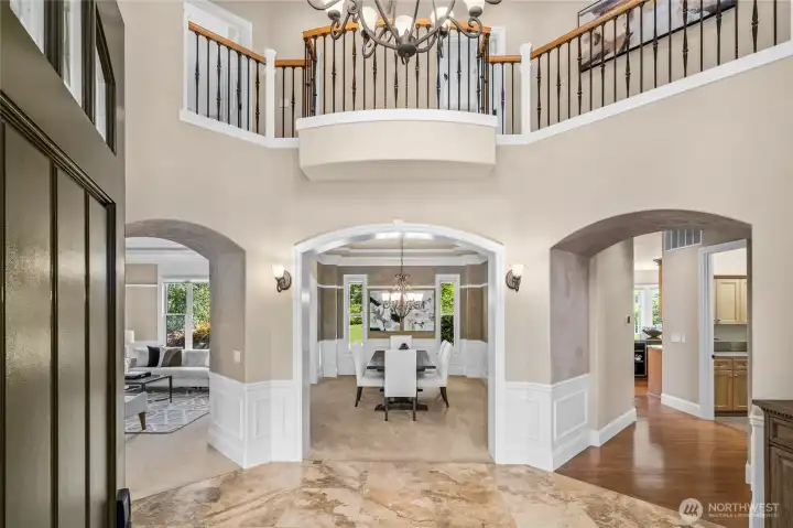 Foyer entry is 2-stories with chandelier