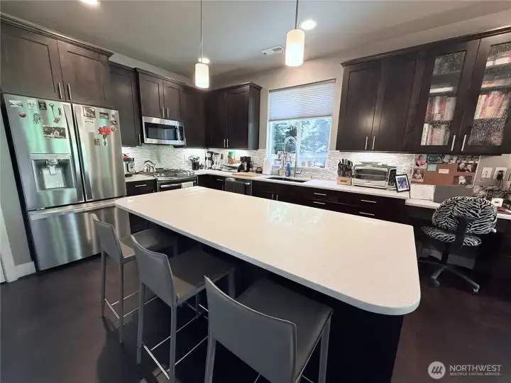Extra high cabinets and desk space Extra high cabinets and desk space