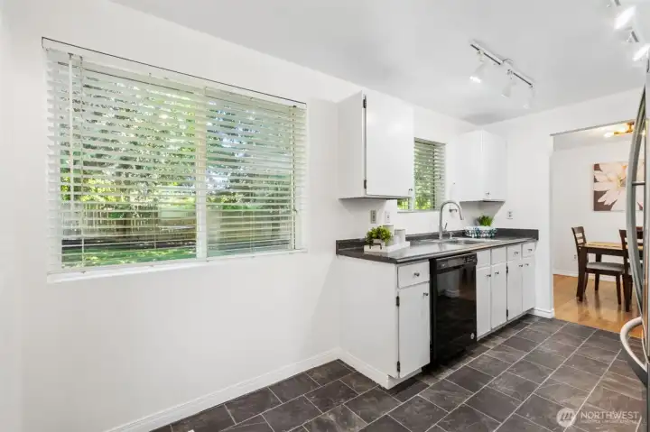 In addition to the designated dining room, there is ample room in the kitchen for your breakfast table.