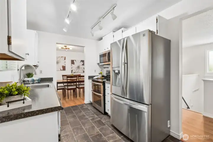 Newer stainless steel appliances round out this kitchen with ample storage, designed for everyday use!