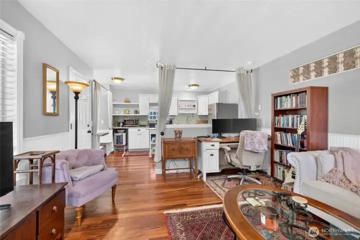 The open concept leads back into the spacious kitchen with the convenient nook. The open concept leads back into the spacious kitchen with the convenient nook.