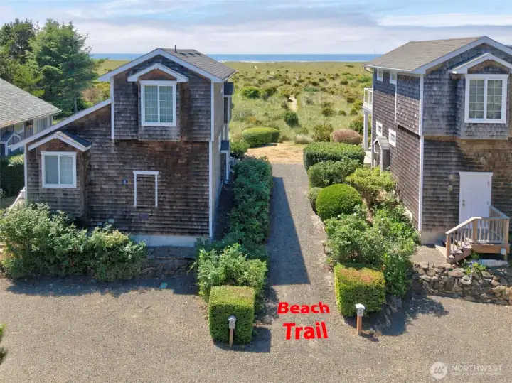 Just steps away is the entrance to the private deeded access beach trail. Just steps away is the entrance to the private deeded access beach trail.
