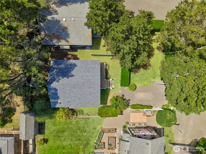 In the overhead shot you can see the lovely garden areas including the shared garden and the picnic area. The shed holds clamming tools and more. In the overhead shot you can see the lovely garden areas including the shared garden and the picnic area. The shed holds clamming tools and more.