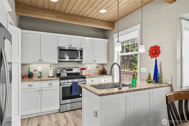 White cabinets and granite countertops