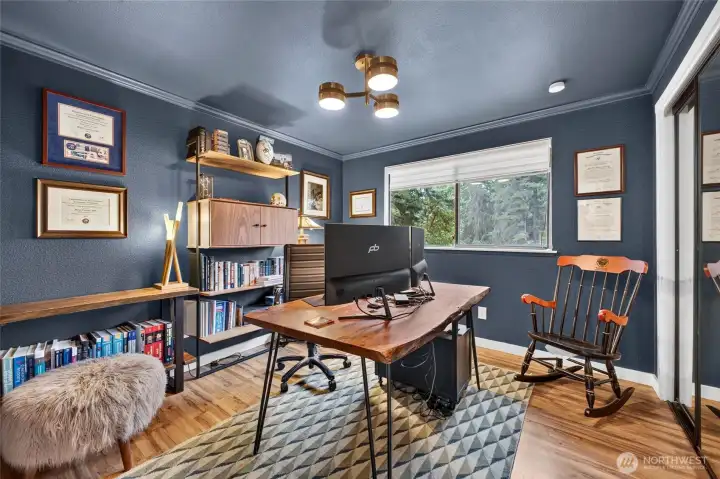 First bedroom upstairs, currently used as an office First bedroom upstairs, currently used as an office