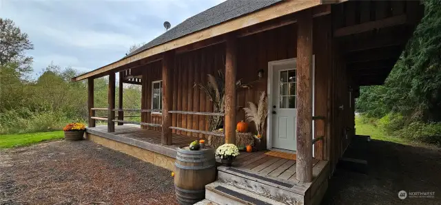 Chalet home on acreage with pond and riverfront.