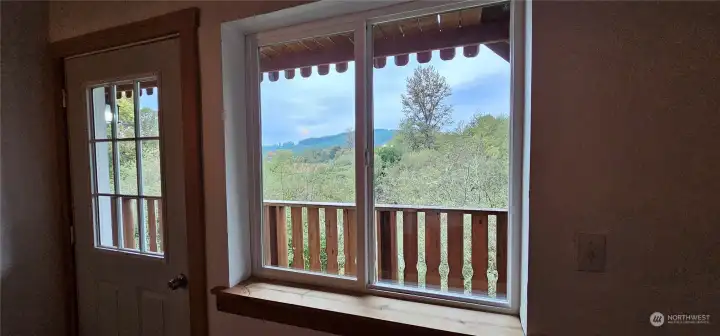 Both bedrooms have door to balcony overlooking the pond and foothills beyond.