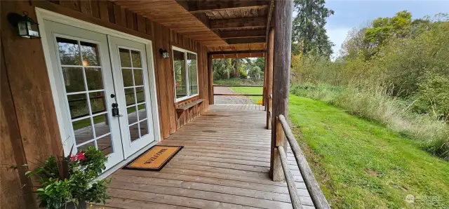 Wrap around deck, french doors, facing the pond.