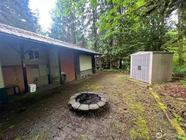 Fire Pit in Back Yard, Washer/Dryer in Back