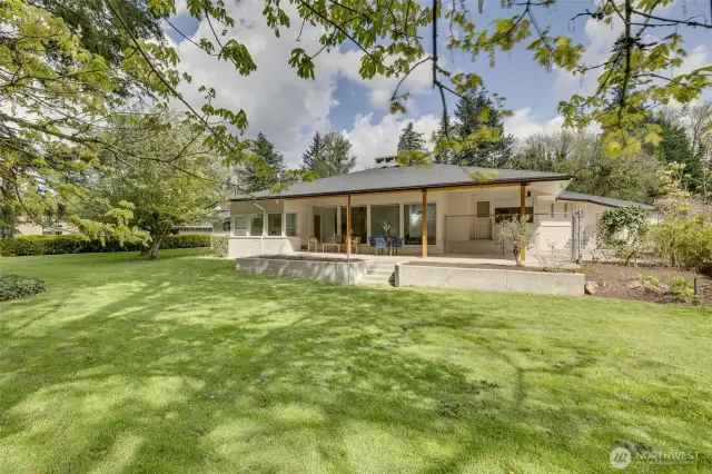 Large grassy backyard with access to Issaquah Creek. Property line is on the other side of the creek