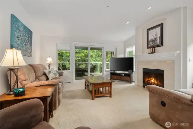 The living area offers deck access and a fireplace for cool mornings.