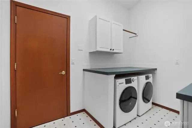 Utility room off the hallway to the garage