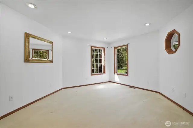 Good sized, light-filled family room off the entry