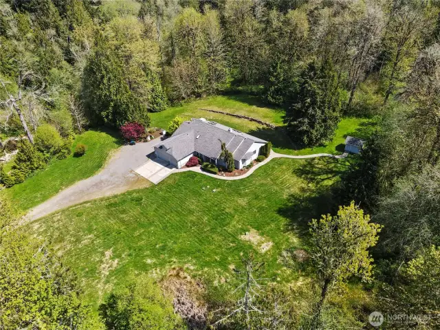 Sited in the middle of a little over 6 acres - what a find!