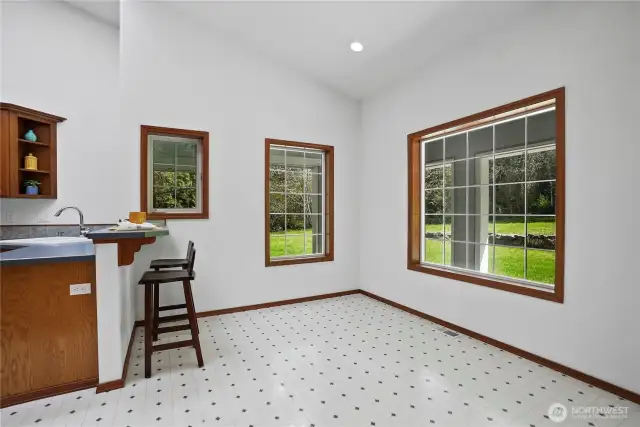 Good sized informal dining space with door to the covered patio