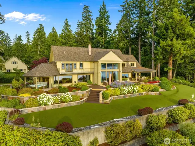 Spectacular home set high on a bluff with 180 degree saltwater views from the NW to the SW.