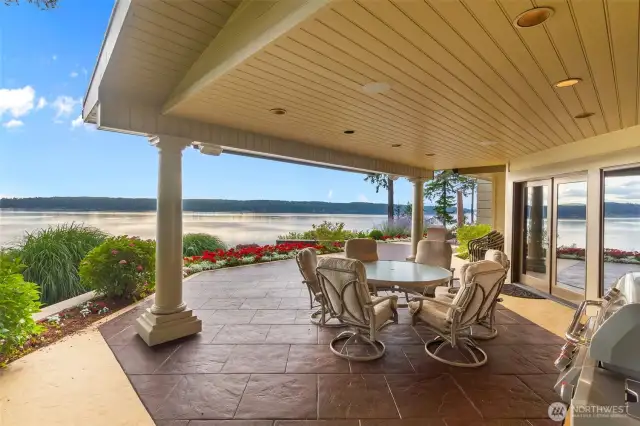 Covered BBQ patio with retractable sun/wind screen. Hartstine Isl views across Puget Sound