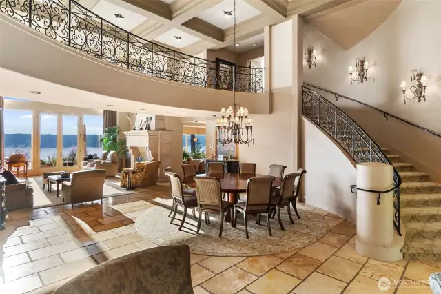 Custom design staircase and overhead breezeway to the upper office, bdrms and entertainment theater/rec room.
