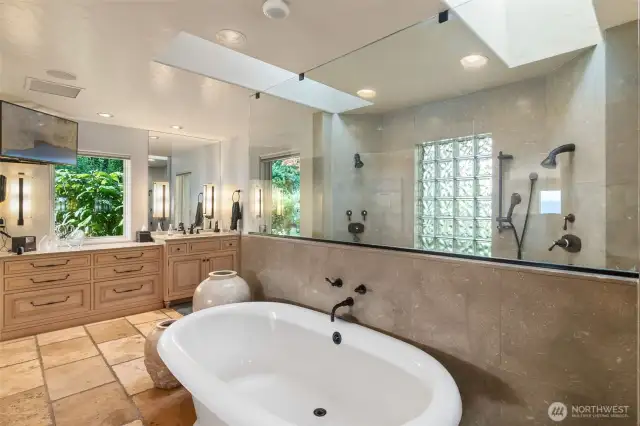 Luxurious Master bdrm bath features His/Hers showers, toilets, huge walk in closets.