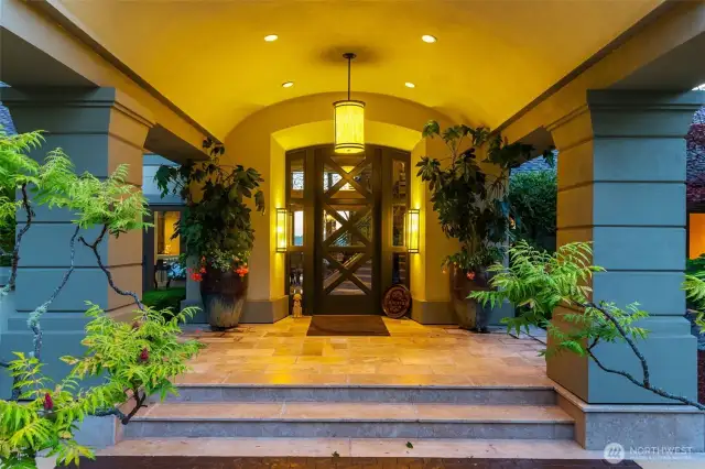 Majestic entryway. Stone, tile features and courtyard