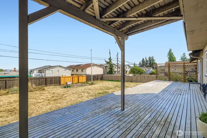 Spacious patio ready for BBQs, cozy evenings, and effortless outdoor living