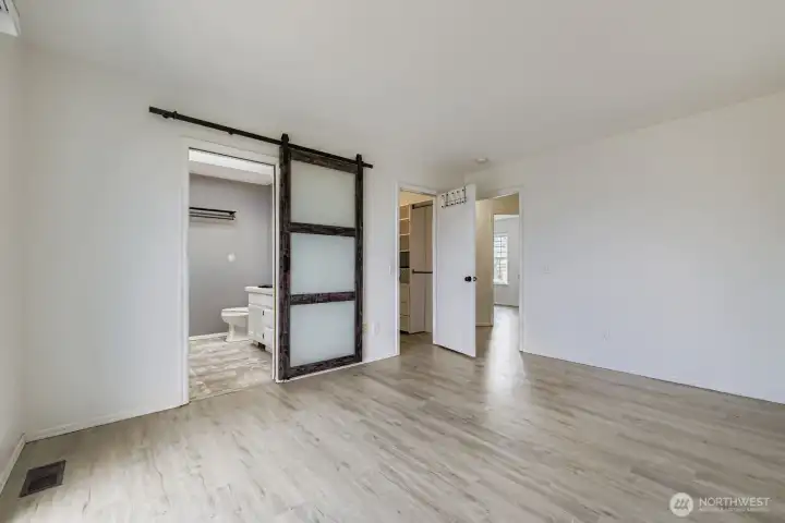Thoughtfully designed en-suite bathroom with a linen closet to keep everything tidy and within reach