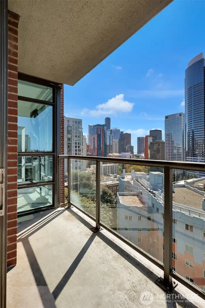 Step out onto your private deck for fresh air and enjoy the sounds of the city.