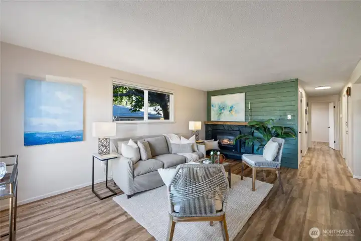 Notice the beautiful luxury vinyl plank flooring throughout the home!