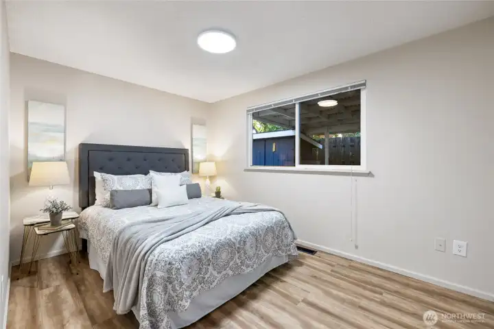 2nd of 4 bedrooms. This is on the opposite side of the home from the primary bedroom & bath.