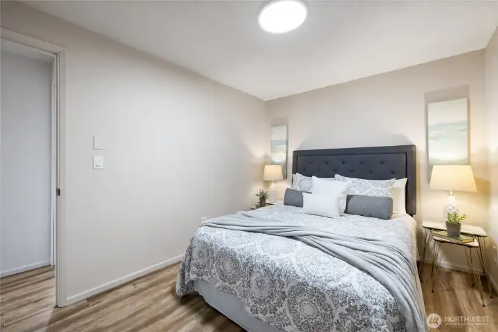 Nice sized bedroom. Beautiful flooring!