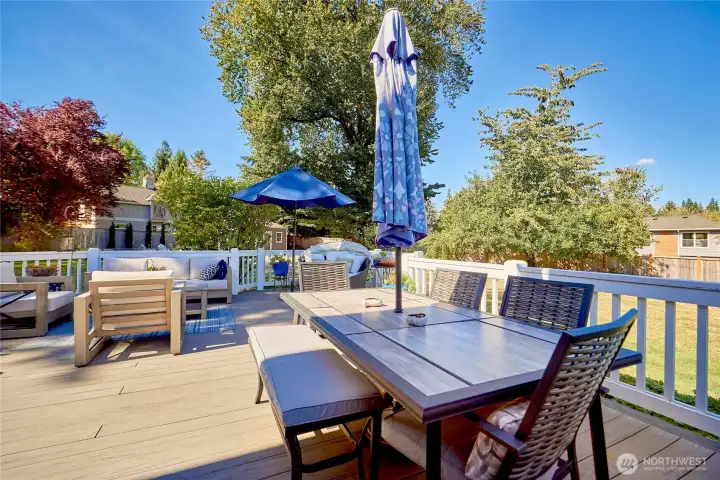 There's also plenty of space for a grill (not pictured) and a large dining table so summer dinners can be enjoyed al fresco. There are also outdoor speakers to enjoy music on the deck.