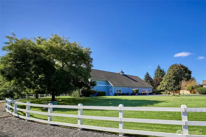 Here's "The Barn" the Farm's multi-use facility with a banquet room, meeting room, fitness room, racquetball court, restrooms/showers and outdoor tennis court, pickleball/basketball court and a large lawn to host outdoor events.