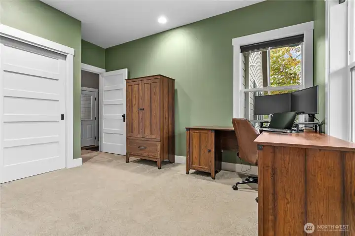 Main level room has been used as an office, but could easily be transformed into a 5th bedroom!