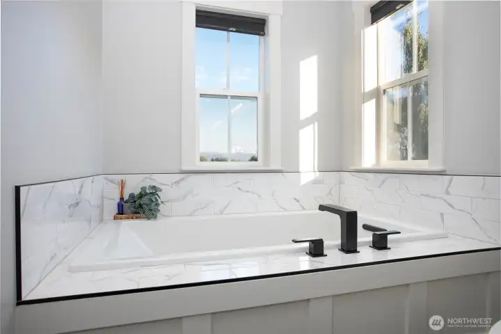 Indulge in more mountain views as you soak in the bubble bath.