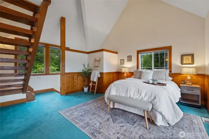 Large Primary suite includes a lofted room with views that could be a home office