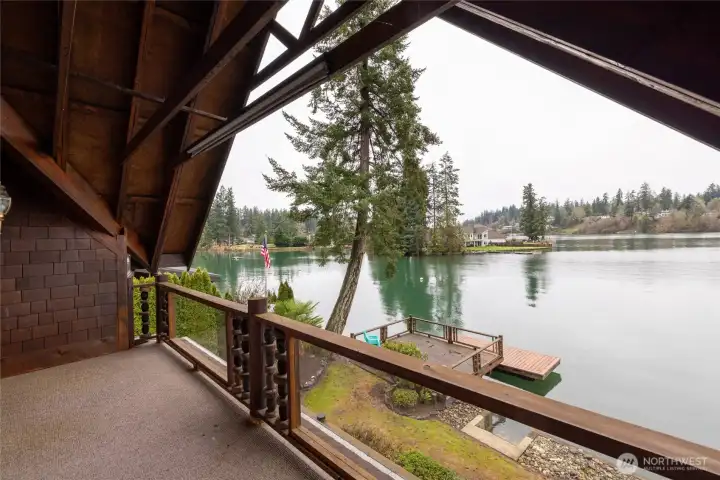 private covered porch off the Primary is the perfect spot to take in natures beauty