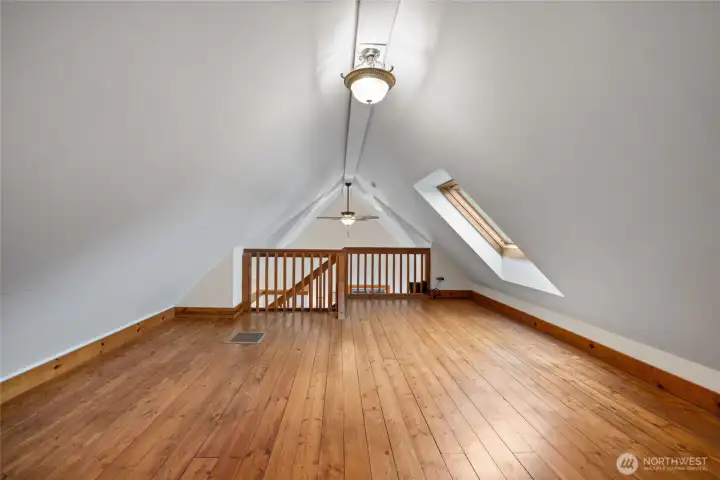 This large loft area is above the Primary bedroom and is the perfect home office space.