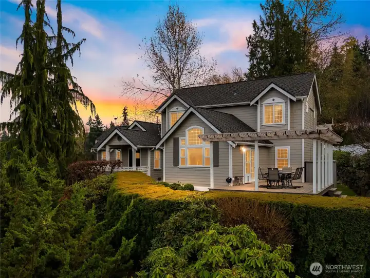 Welcome home to this beautifully crafted home, glowing with warmth and curb appeal